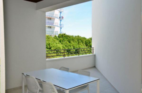 Bright white flat in the heart of Bibione